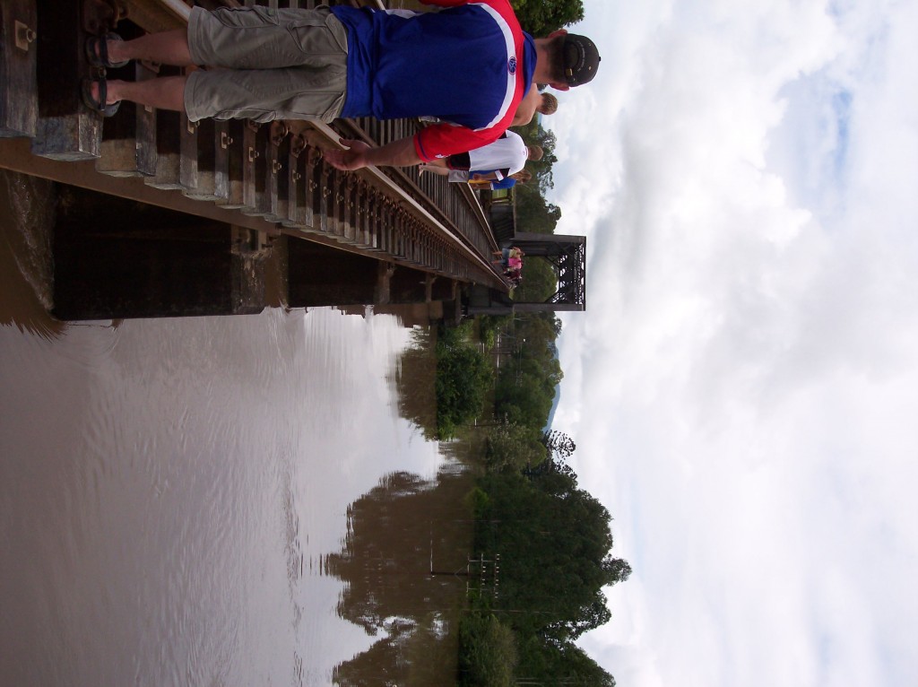 People using hte railway line as a bridge